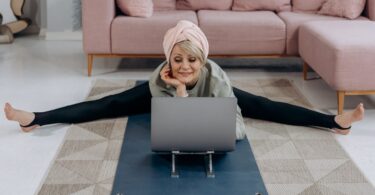 "Seniors participating in a virtual yoga class from the comfort of their own home"